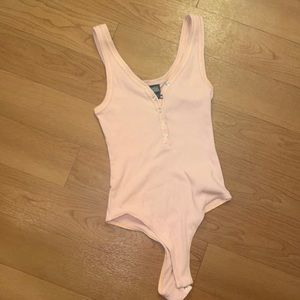 Wild Fable body suit. Light pink. Brand new. Size XS